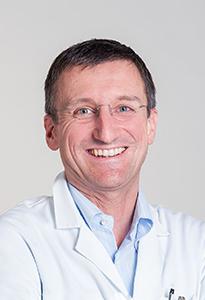 Жан-Пьер Буркен, онколог-гематолог